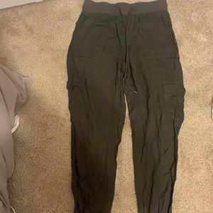 Green cargo pants with a lot of pockets